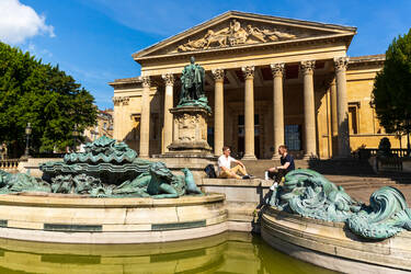 External photo of The Victoria Rooms showing fountains.